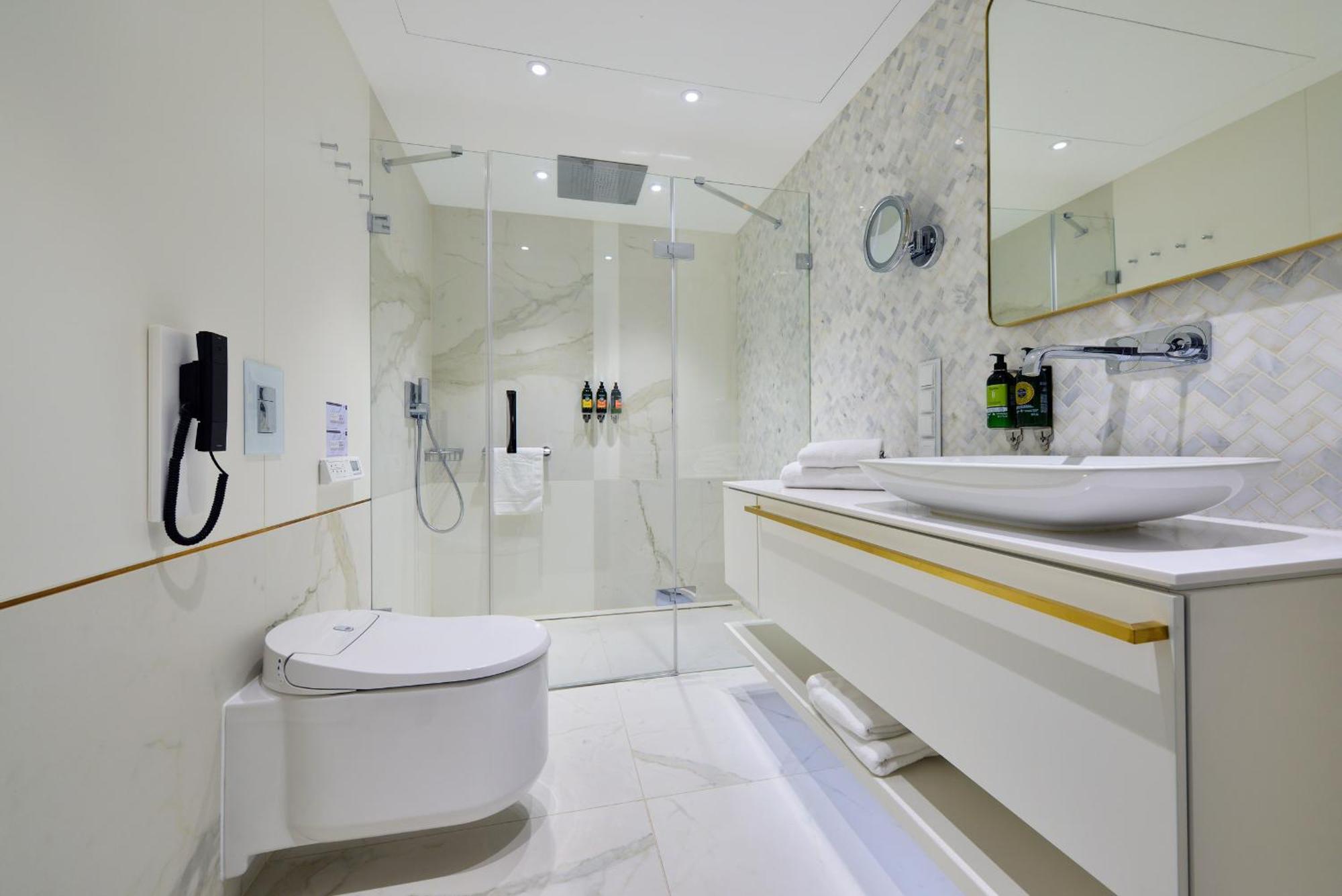 Hotel Ferreus Modern Art Deco Krakau Exterior foto A modern bathroom